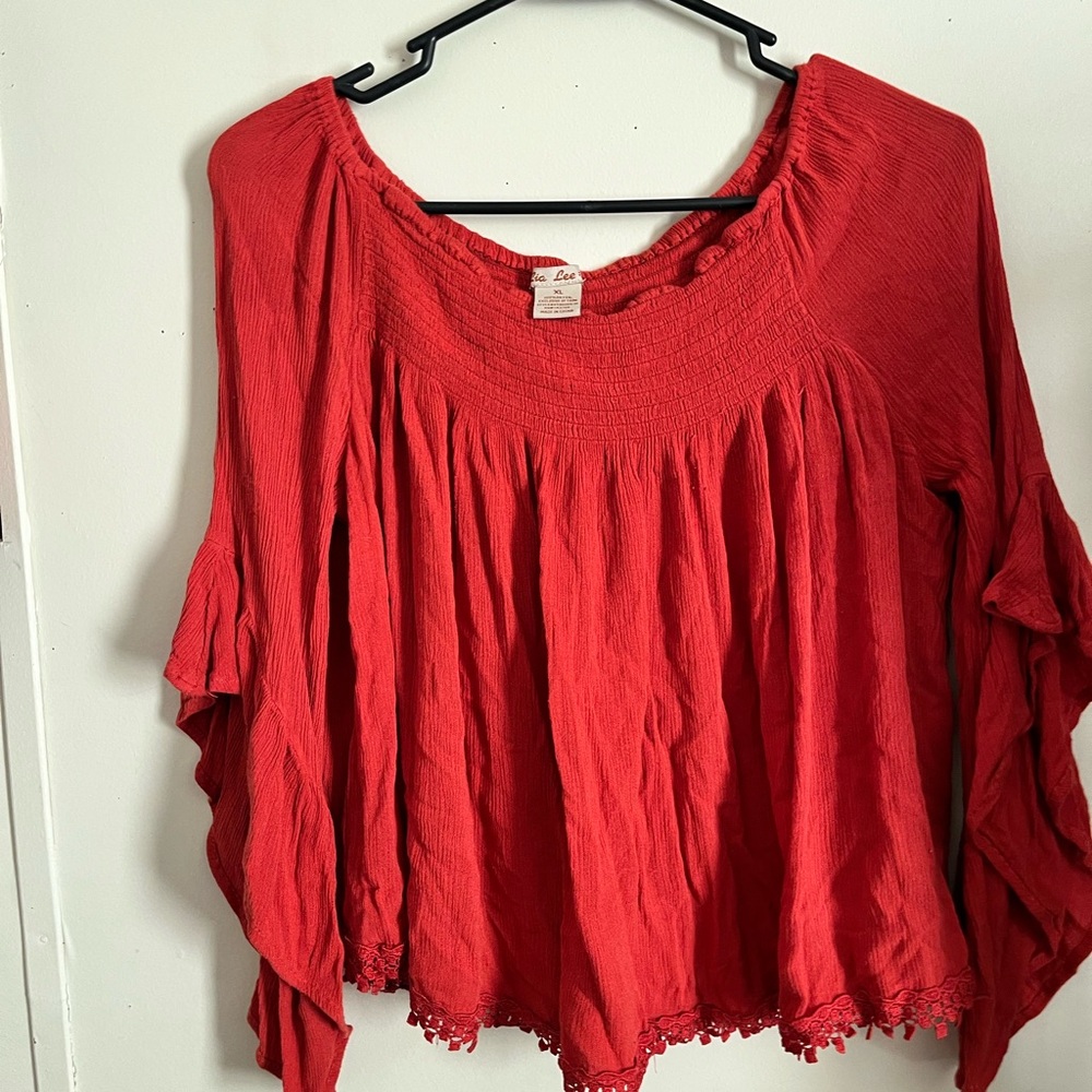 Burnt orange off the shoulder shirt